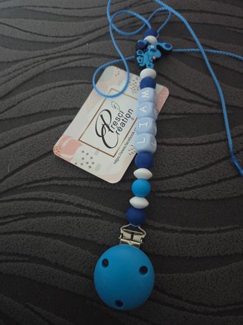 Attache tétine silicone chien bleu