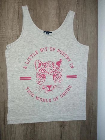 T shirt gris avec un tigre taille XS Kiabi