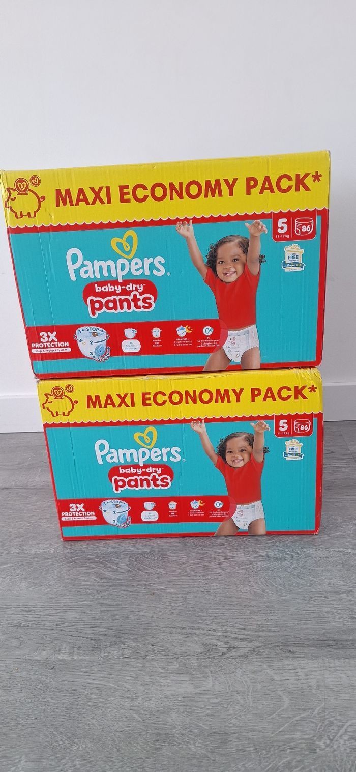 2 paquets de couches pampers taille 5 pants neuf
