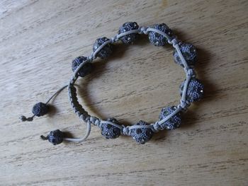 Shamballa gris avec strass