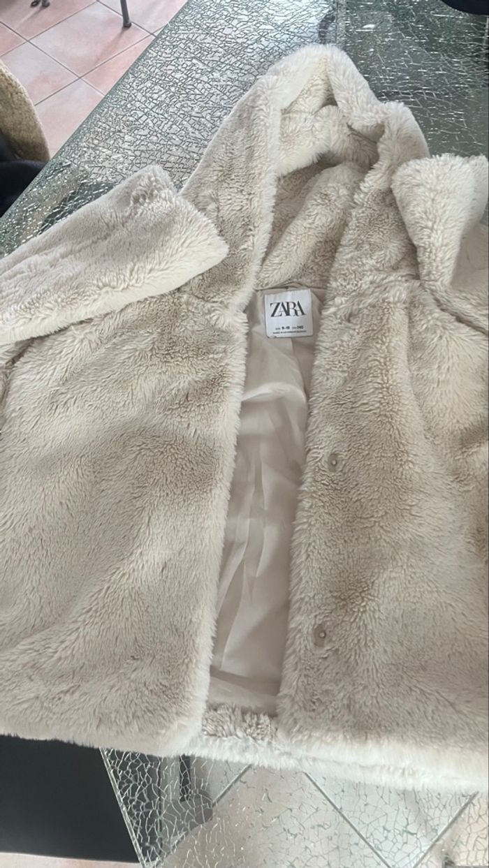 Veste en fausse fourrure fille  9/10