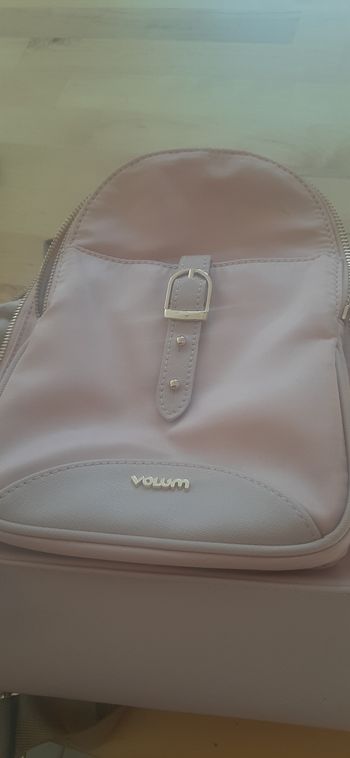 Petit sac à dos main rose poudré
