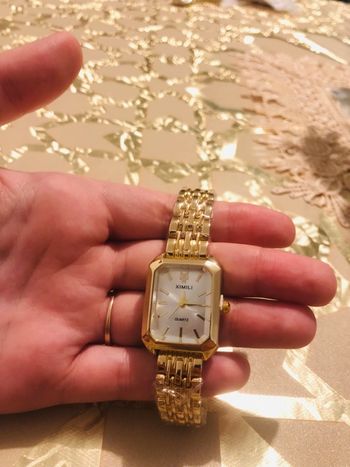 Montre femme dorée  en acier inoxydable