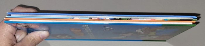 Lot de 2 livres disney mickey et le trésor du pirate eh bienvenue chez les robinson - photo numéro 5