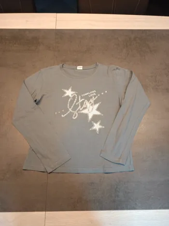 Vends tee-shirt manches longues mi saison complice taille 12 ans .