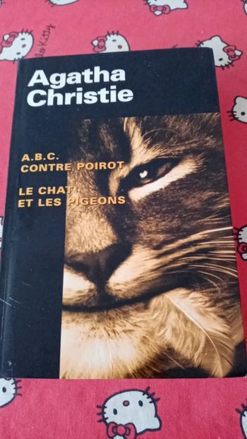 A B C contre poirot/ le chat et les pigeons