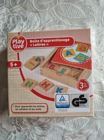 Jeu de boite d'apprentissage les lettres