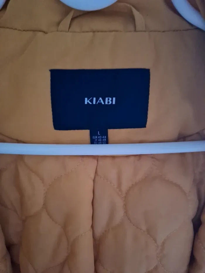Manteau a capuche jaune - photo numéro 3