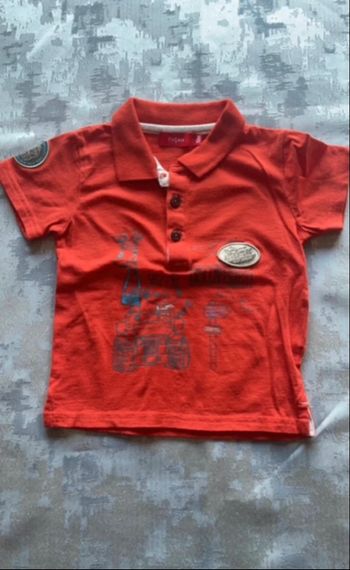 Polo manches courtes garçon – Orange à motifs – 12 mois