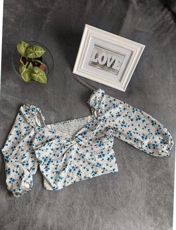 Top fleuri manches longues taille S