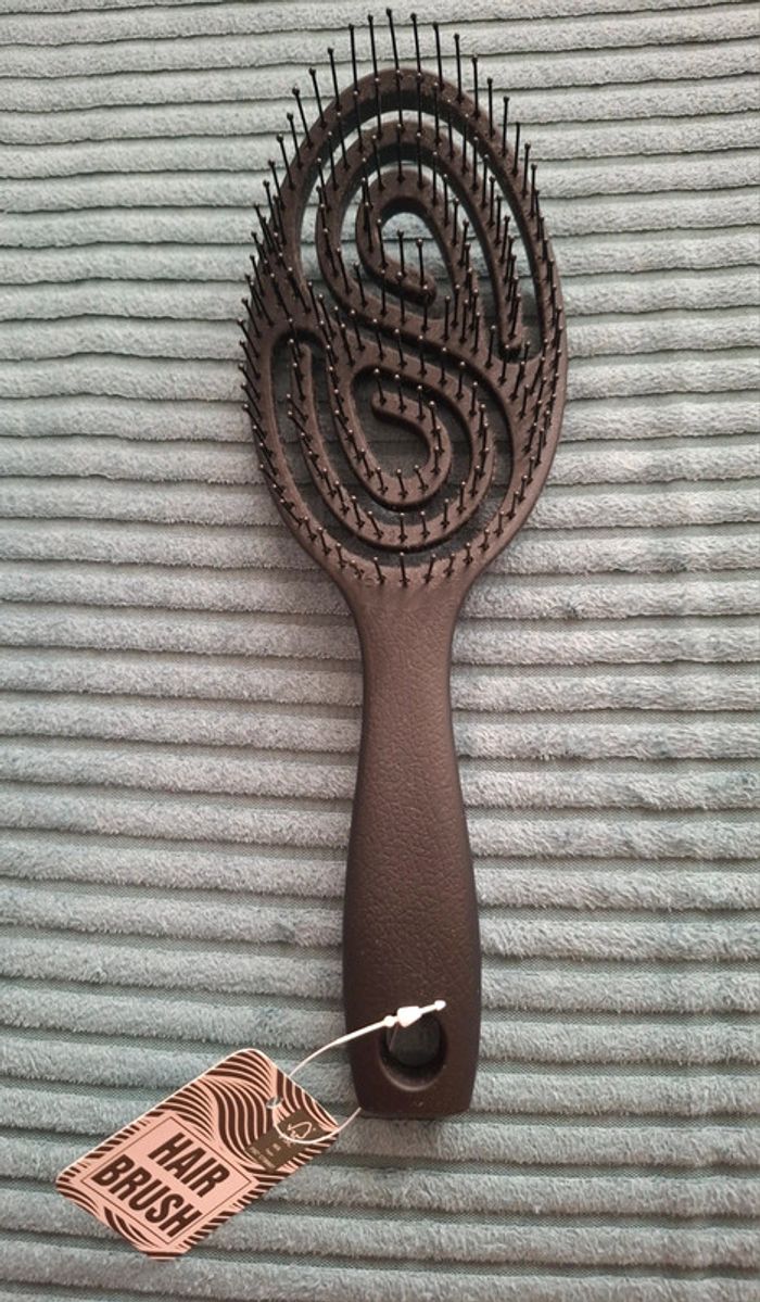 Brosse peigne noir Neuve