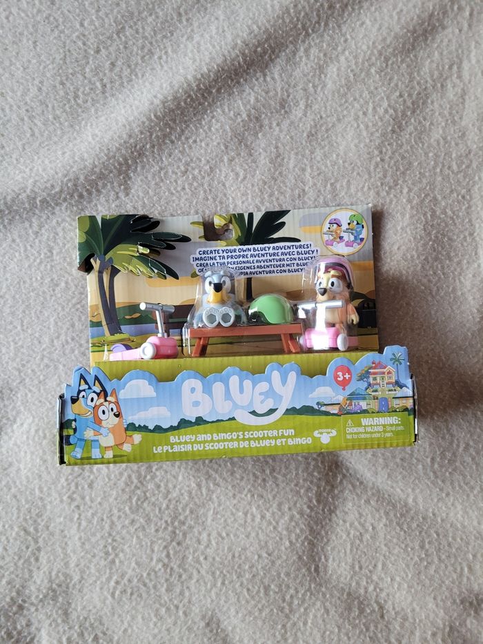 Bluey and Bingo's scooter fun