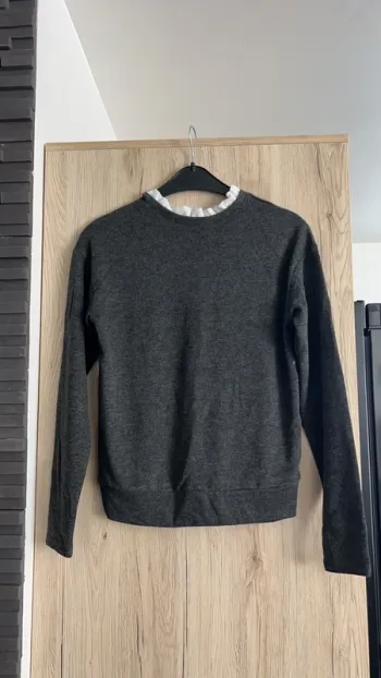 Pull avec col volanté