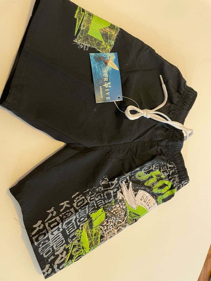 Short de bain noir taille 6 ans survive sport