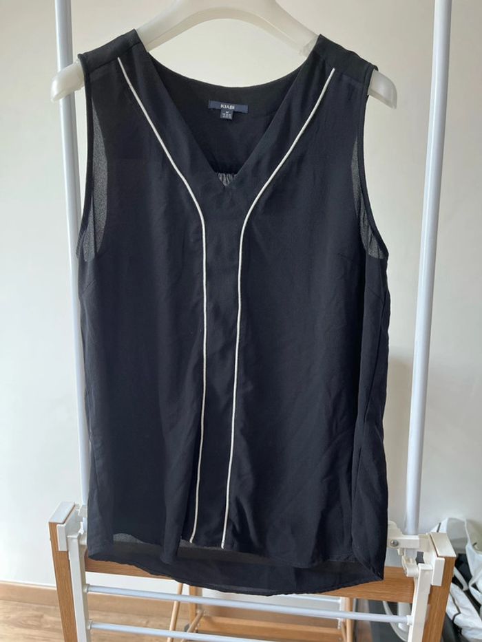 Haut femme couleur noir Kiabi taille M très bon état