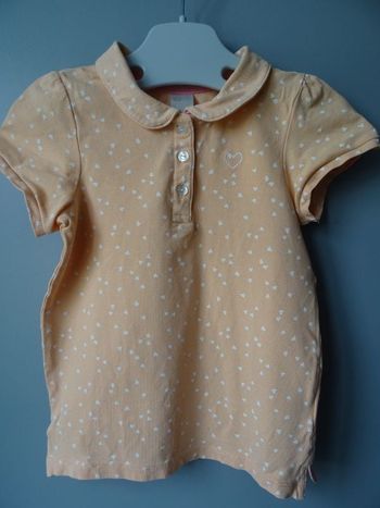 polo orange à manches courtes