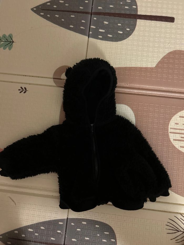 Veste noir à capuche oreille