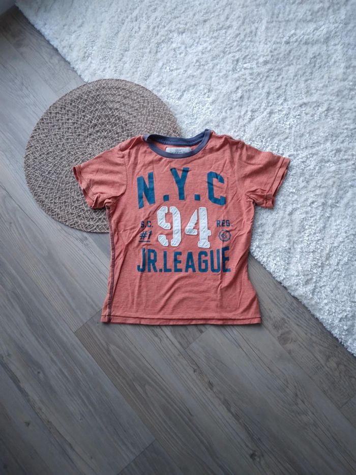 🌸Tee-shirt orange avec imprimé en relief 6ans a 1€🌸