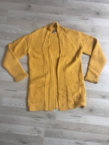 Gilet long tape à l’œil.