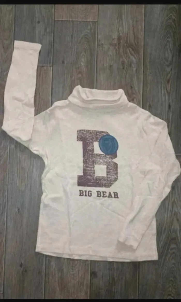 joli t-shirt manches longues et col roulé beige 8 ans / 128 cm Très bon état Kiabi