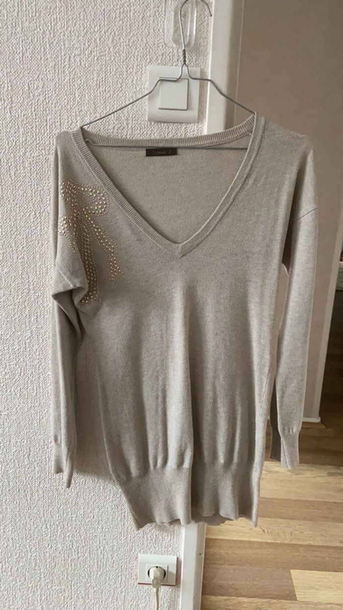 Pull long femme