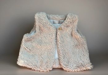 Veste fourrure sans manches in extenso