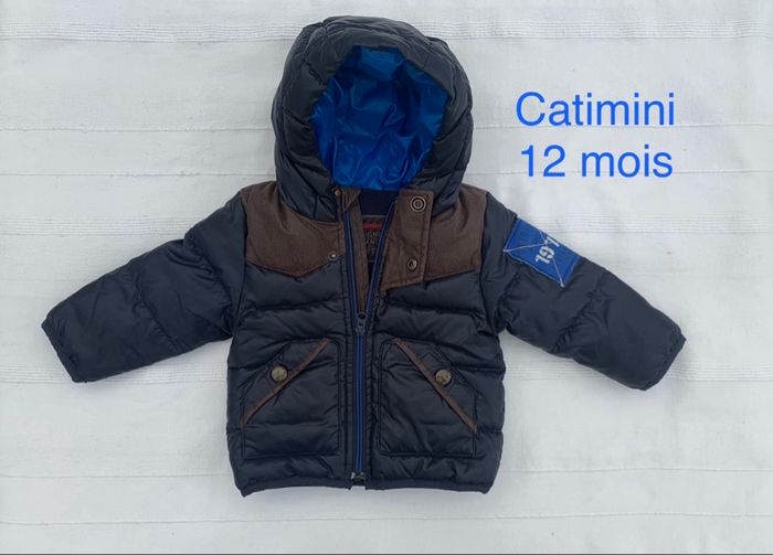 Magnifique  doudoune Catimini taille 12 mois état neuf car  portée que 2 fois.