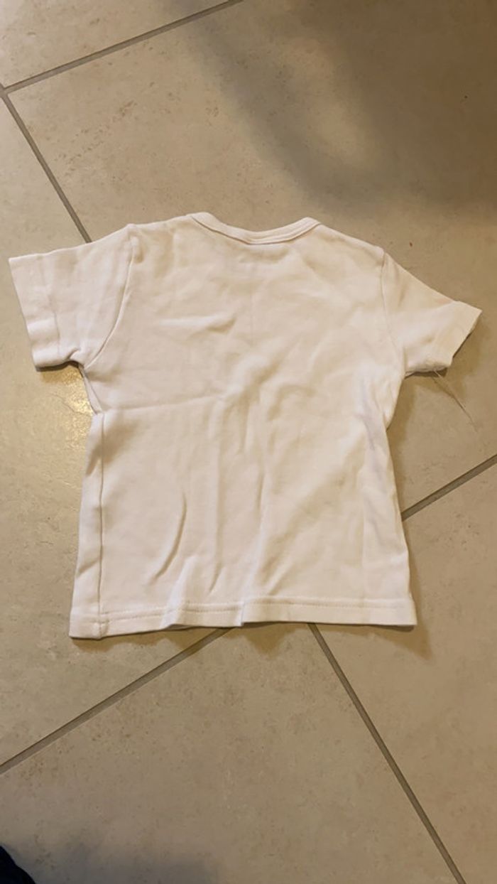 Taille 86 blanc motif violet et argenté . Neuf - photo numéro 3