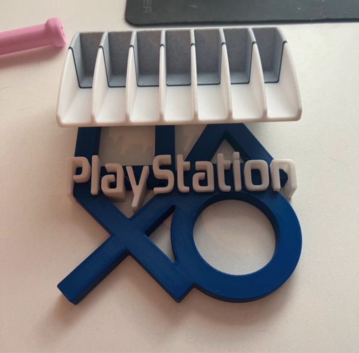 Support de jeux compatible PlayStation - photo numéro 2