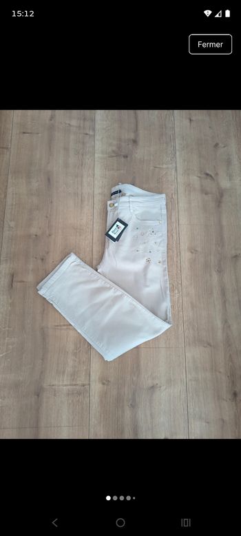 Pantacourt River Woods beige – Broderies fleurs et strass – Neuf avec étiquette
Description
