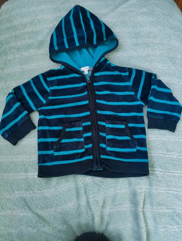 Gilet a capuche