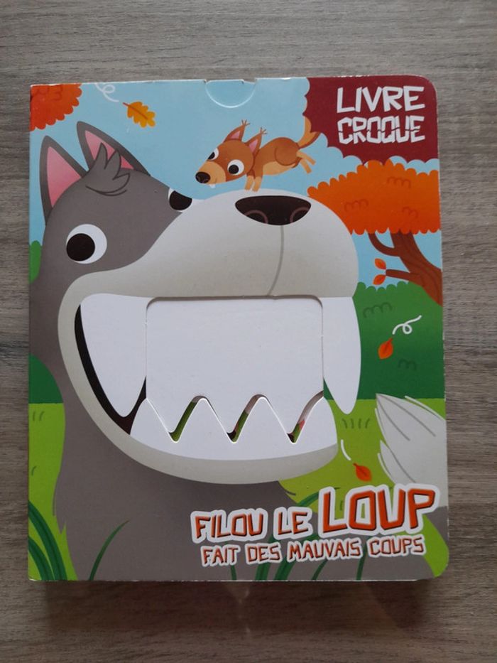 Livre croque "filou le loup"