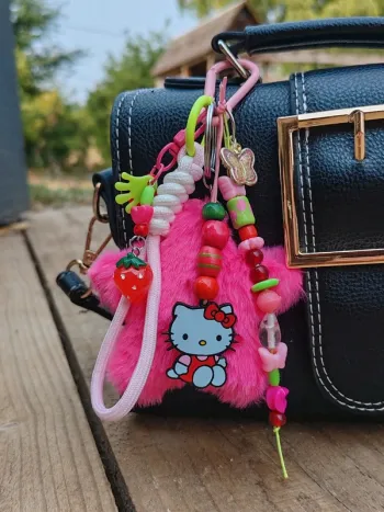 Bijou de sac gri-gri hello kitty rose et vert
