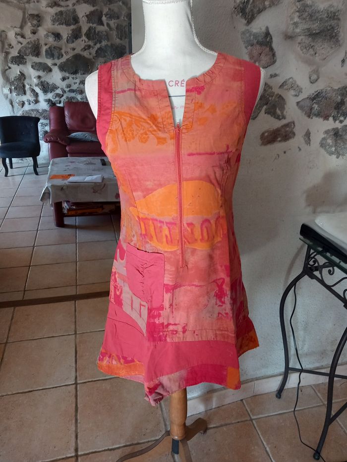 Robe longueur 80 cm.