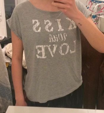 Tee shirt gris motif oversized taille M