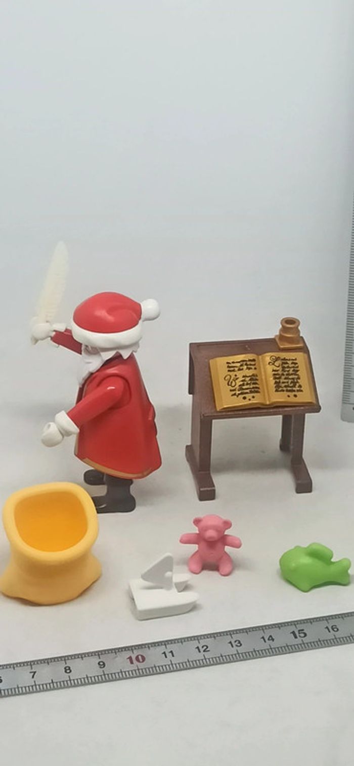 Homme père noel avec pupitre et hotte de jouets playmobil - photo numéro 3