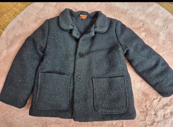 Manteau bleu marine et or