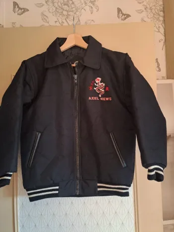 Manteau chaud qualité axel news 12 ans garçon tbe
