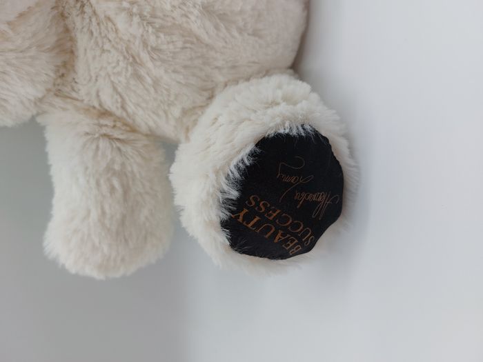 Peluche doudou ours blanc Beauty success Alexandra Lamy noeud doré 21 cm - photo numéro 2
