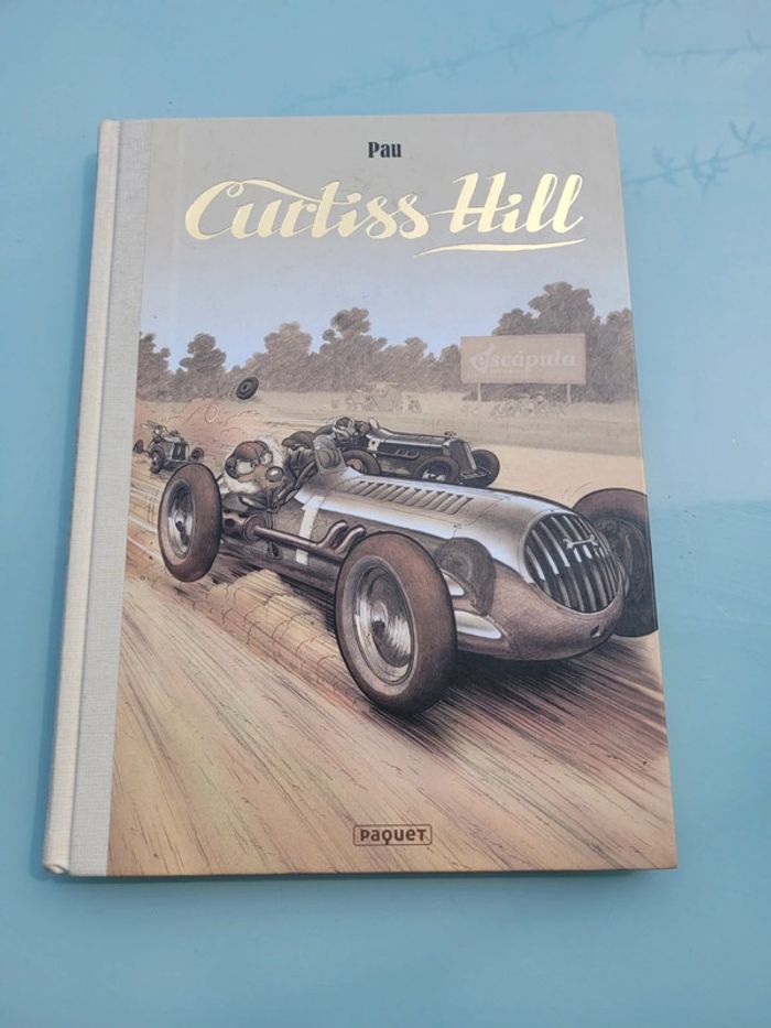 BD Curtiss Hill, Pau, Éditions Paquet