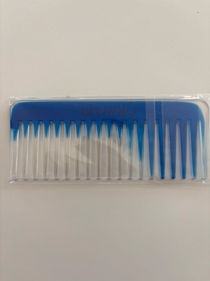 Peigne Glowria bleu neuf sous plastique