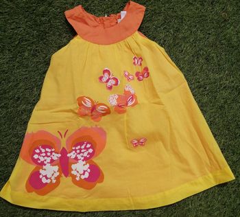 Jolie petite robe jaune et orange papillons