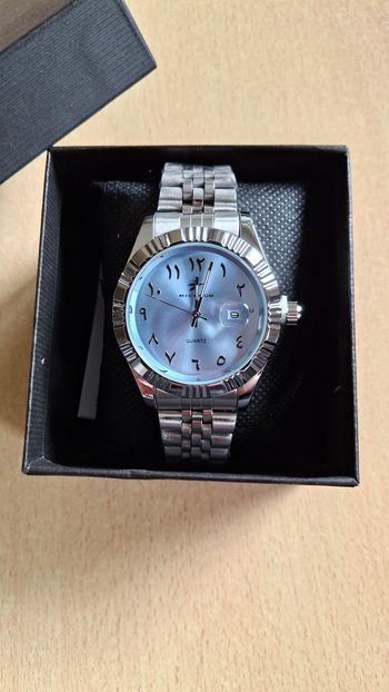 Montre pour homme arabic dial bleu clair nacré 