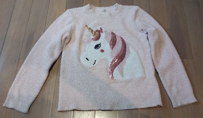 Pull rose licorne