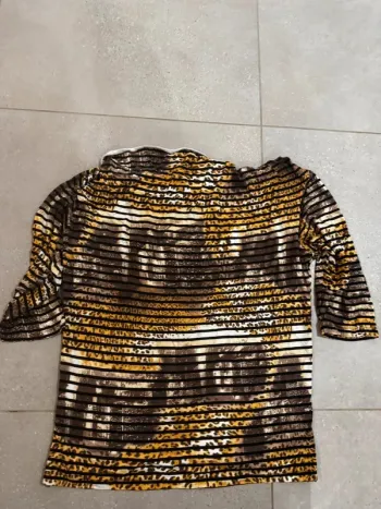 Haut couleur léopard, très bon état, taille XL