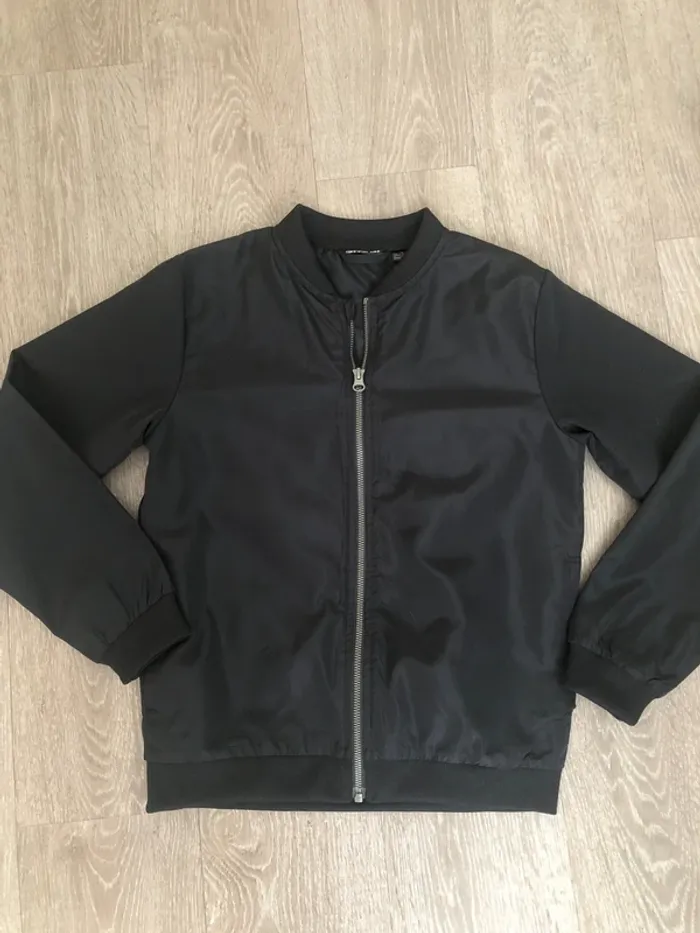 Blouson fin taille 10/11 ans état 9 porté une fois
