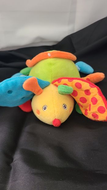 Peluche/ doudou coccinelle musical et sensoriel boîte à musique marque Baby club