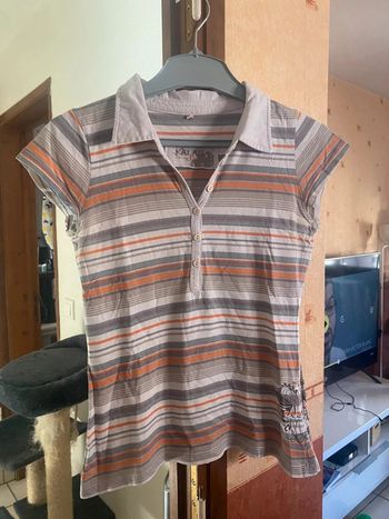 Polo femme taille 38 très bon etat