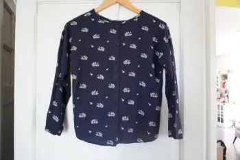 Chemise manches longues monoprix motif aille 12 ans