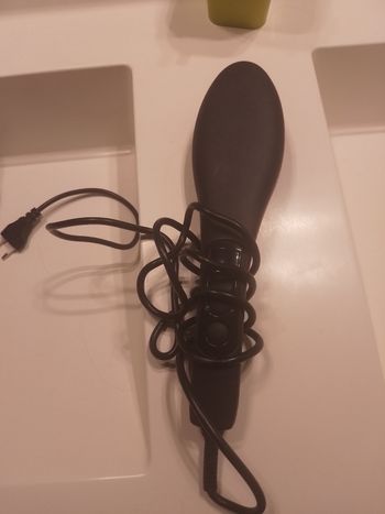 Brosse chauffante et lissante